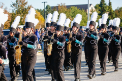 Marching band performing at parade.