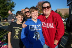 Two people posing together for a picture at an event.