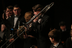 Man playing a trumpet in a band.
