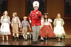 Theatrical performance of "The Music Man" on stage in 2024.