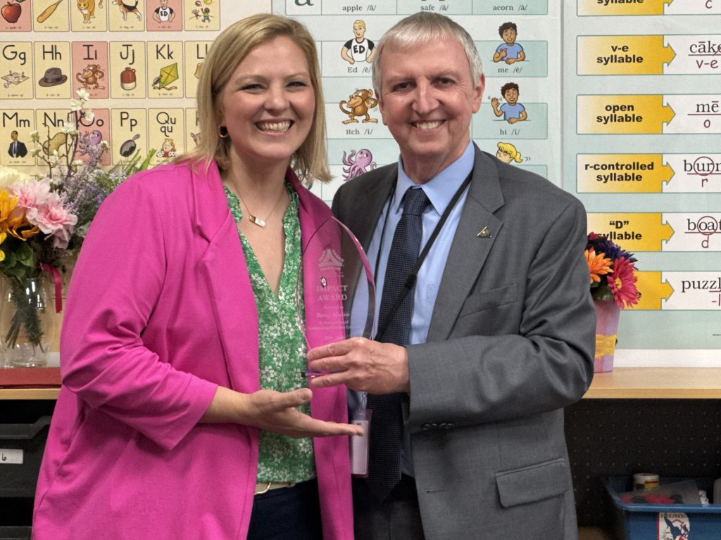 Betsy Alwine wins IMPACT Award