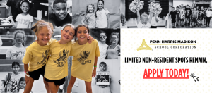 Three girls in yellow shirts posing for a picture.