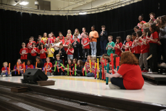 School children performing in a concert band.