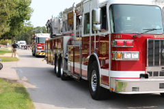 Red fire truck parked on street.